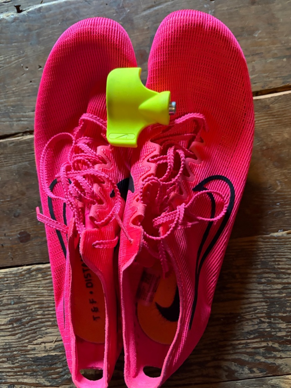Nike Pink and Yellow Sprint Spikes with Black Swoosh